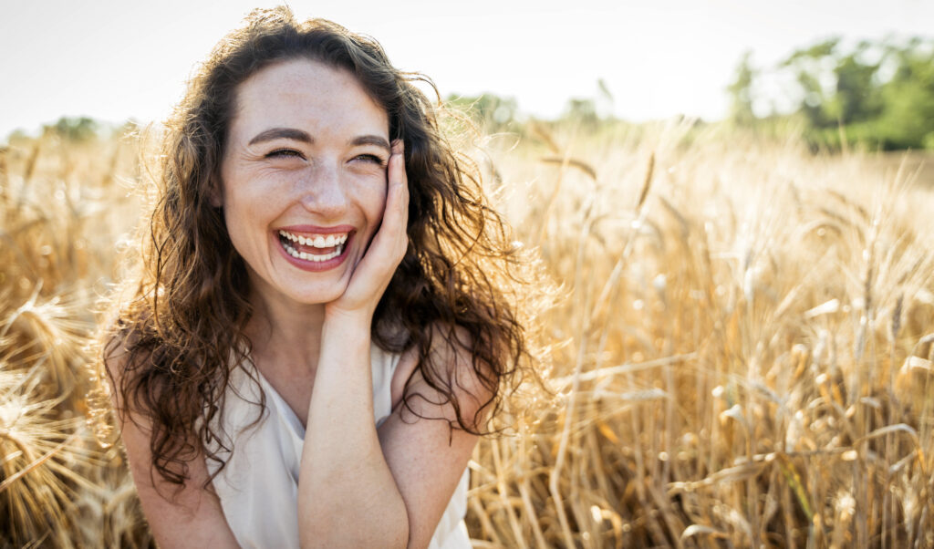 happy beautiful woman smiling in a wheat field delightful fema