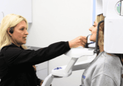 Jennifer giving a dental xray at Tennessee Valley Oral Surgery